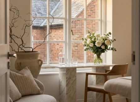 Minimalist aesthetic clinic interior with consultation desk and calming neutral decor Minimalist aesthetic clinic interior with consultation desk and calming neutral decor