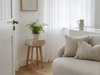 Bright and calm aesthetic clinic consultation room with neutral decor and soft natural daylight