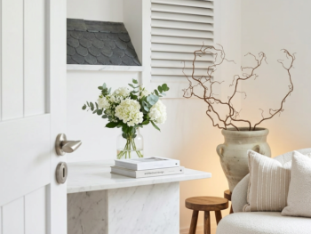 Clean and modern aesthetic clinic consultation room with neutral decor and soft lighting Clean and modern aesthetic clinic consultation room with neutral decor and soft lighting