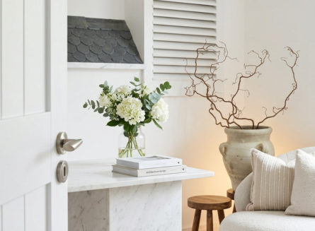 Clean and modern aesthetic clinic consultation room with neutral decor and soft lighting Clean and modern aesthetic clinic consultation room with neutral decor and soft lighting